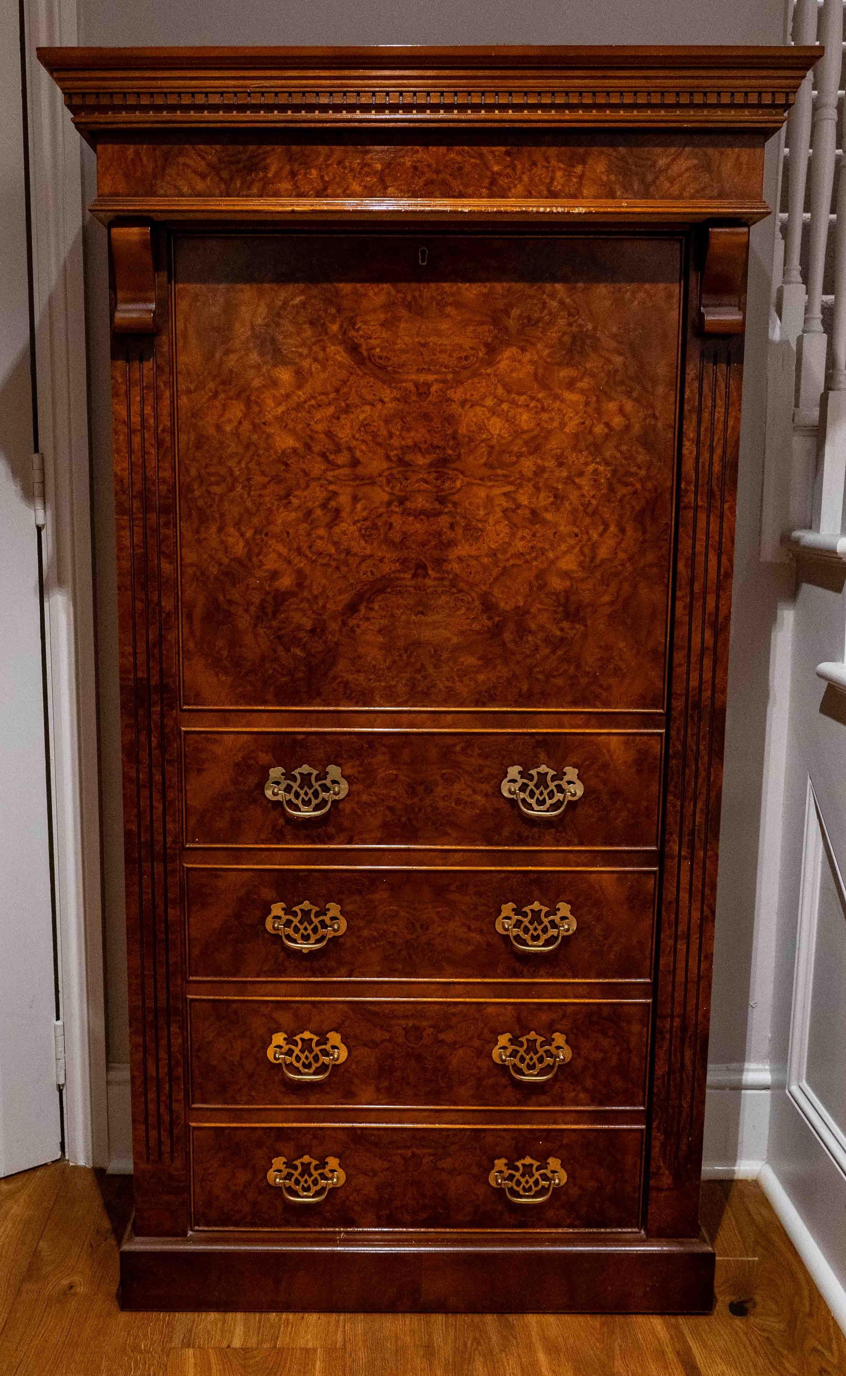 A reproduction burr walnut gun cabinet, width 84cm, depth 40cm, height 157cm. Condition - fair